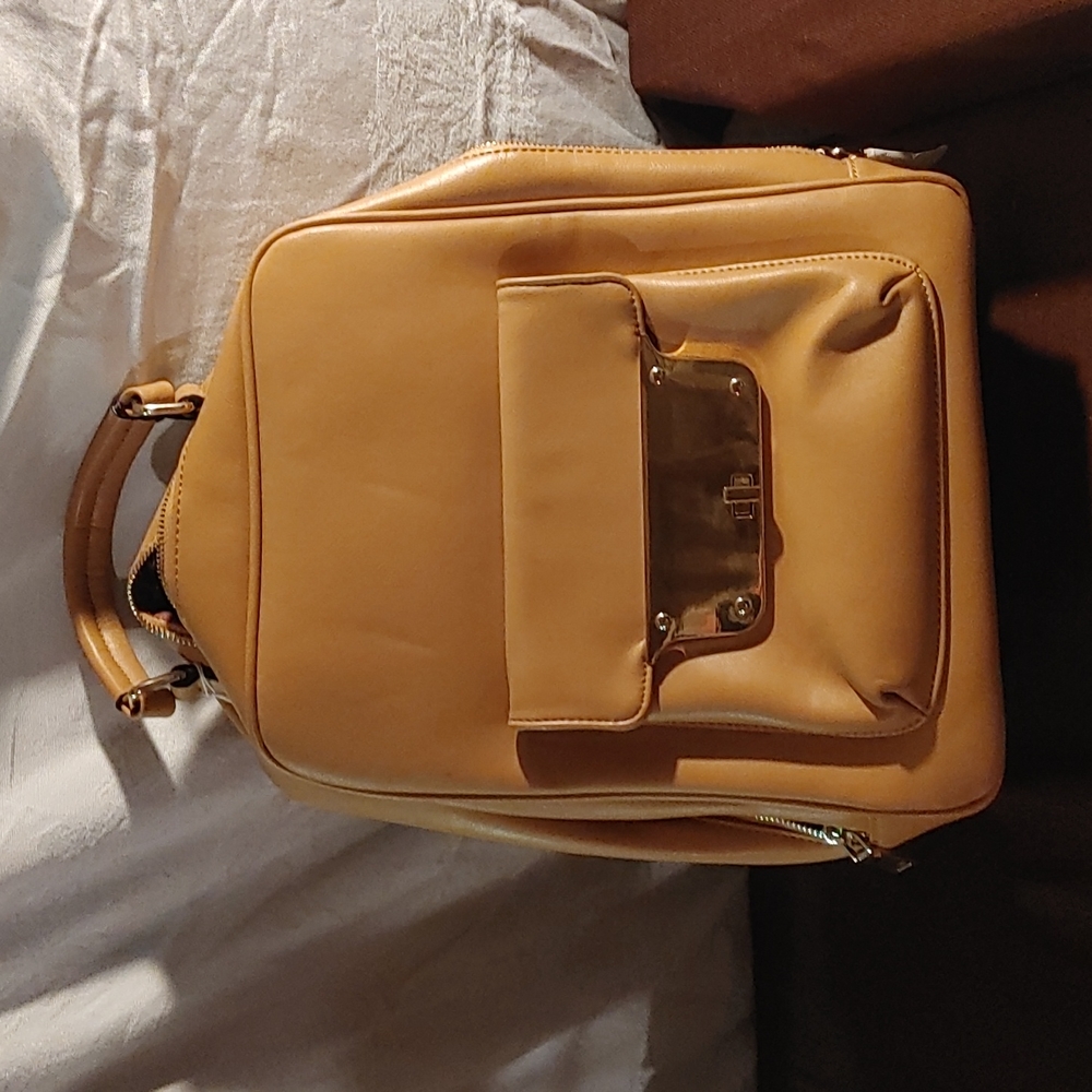 Ladies brown backpack purse